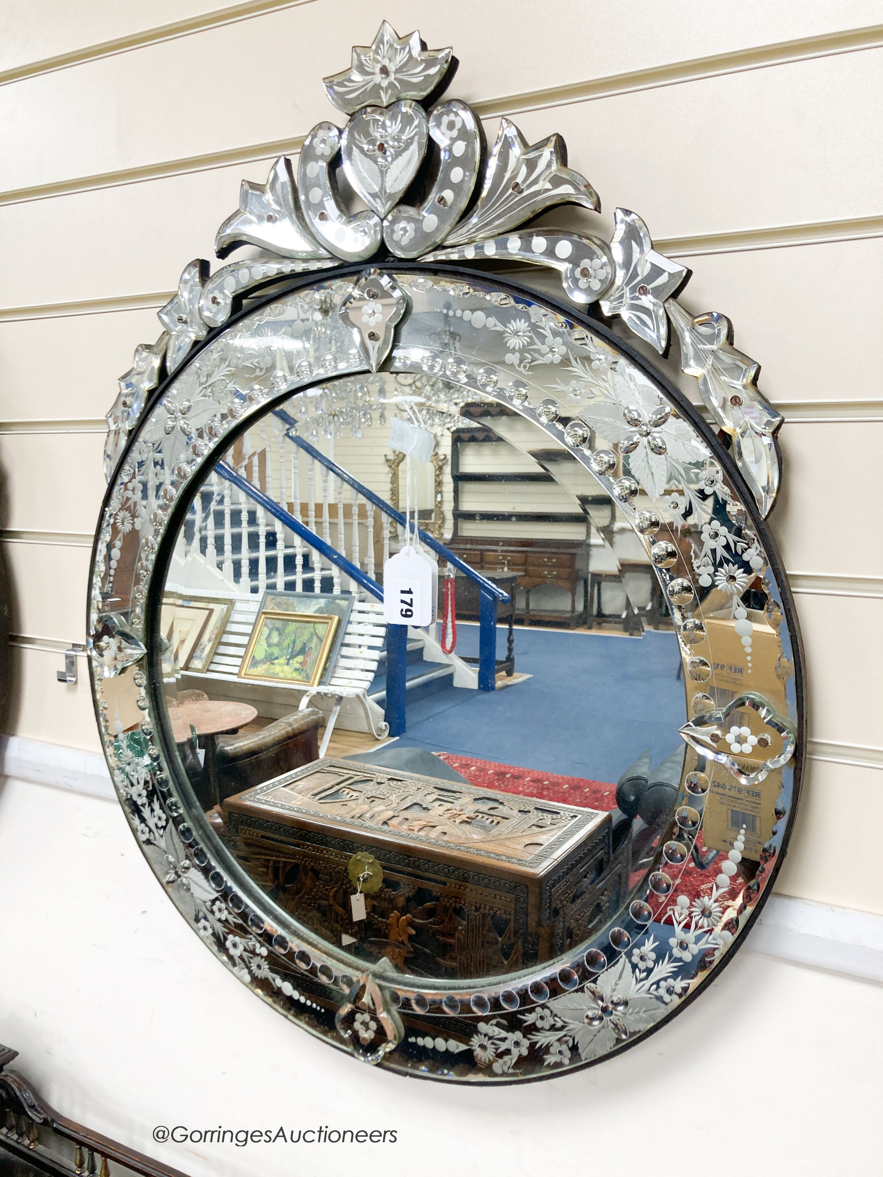 A pair of circular Venetian etched glass mirrors, diameter 58cm